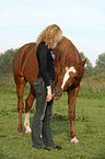 young woman with horse
