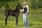 young woman with foal