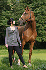 young woman with mare