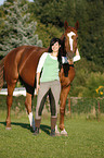 young woman with mare