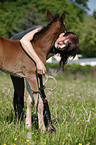 woman with foal
