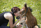 woman with foal