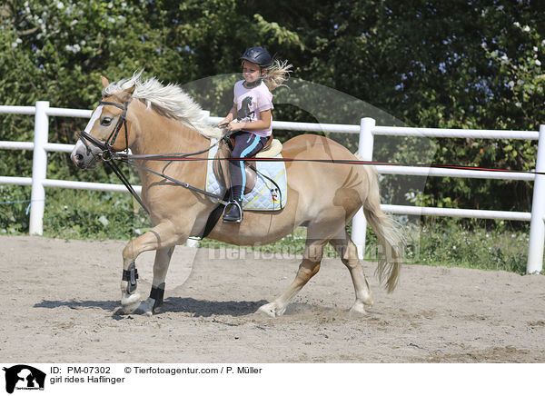 Mdchen reitet Haflinger / girl rides Haflinger / PM-07302