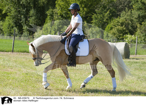 Frau reitet Haflinger / woman rides Haflinger / NS-05874