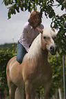 woman with Haflinger horse