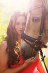 woman and Haflinger horse