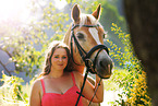 woman and Haflinger horse