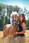 woman and Haflinger horse