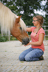 woman and Haflinger