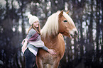 Haflinger with woman