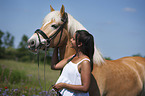 woman with Haflinger