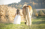woman and Haflinger