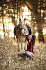 woman and Haflinger