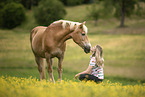 woman and Haflinger