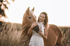 woman and Haflinger