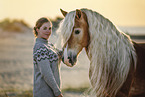 woman and Haflinger horse