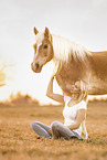 woman and Haflinger horse