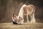 woman and Haflinger horse