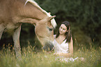 woman and Haflinger horse