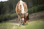 woman and Haflinger horse