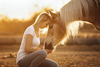 woman and Haflinger horse