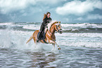 woman and Haflinger horse