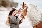 woman and Haflinger horse