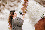 woman and Haflinger horse