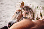 woman and Haflinger horse