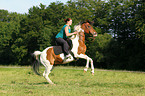 woman rides half-caste
