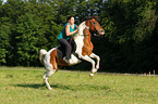 woman rides half-caste