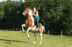 woman rides half-caste