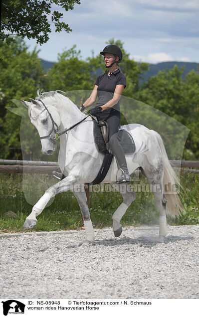 woman rides Hanoverian Horse / NS-05948