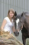 woman with Hanoverian horse