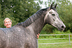 woman with Hanoverian horse