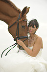 woman with Hanoverian horse