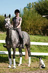 woman rides Hanoverian