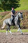 woman rides Hanoverian