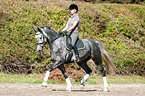 woman rides Hanoverian