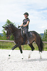 woman rides Hanoverian Horse