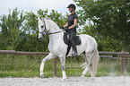 woman rides Hanoverian Horse