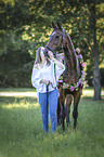 young woman with Hanoverian Horse