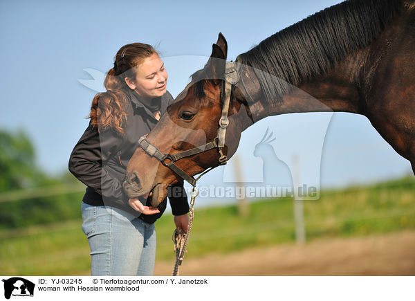 woman with Hessian warmblood / YJ-03245
