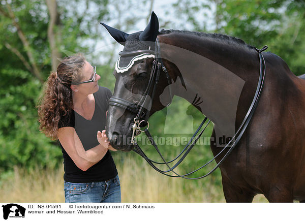 woman and Hessian Warmblood / NS-04591
