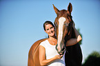 woman and Hessian Warmblood
