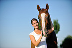 woman and Hessian Warmblood