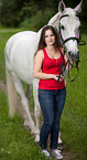 woman and hessian warmblood