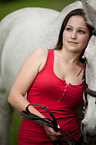 woman and hessian warmblood