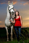 woman and hessian warmblood