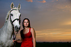 woman and hessian warmblood